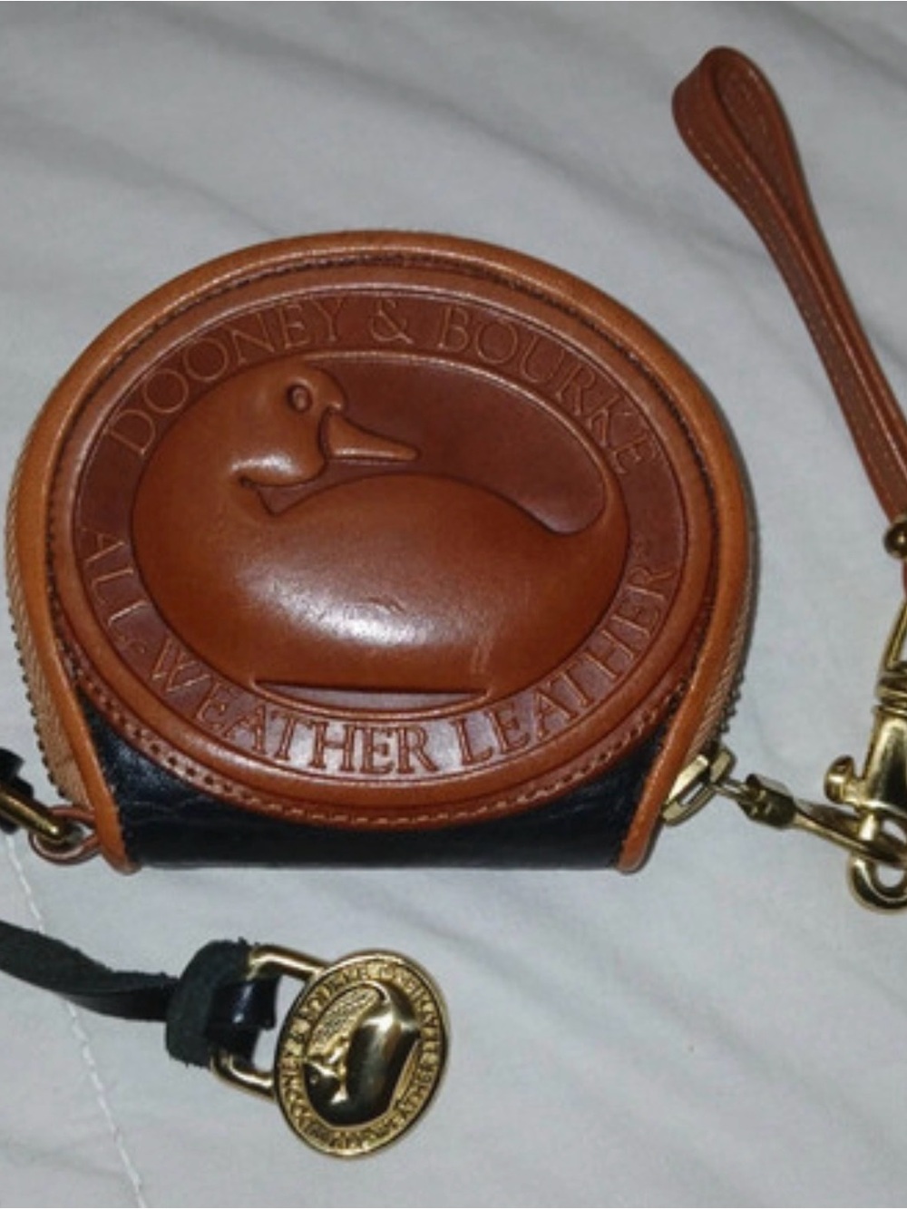 Dooney & Bourke Brown and Black Leather Round Coin Pouch with Duck Medallion